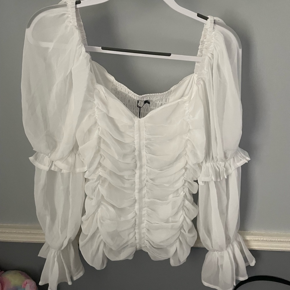 White ruffle top
